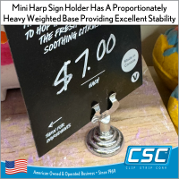Mini harp sign holder has a proportionately heavy weighted base which provides excellent stability, HPH-15, by Clip Strip Corp.