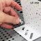 Fastener for gondola metal shelf perforations, regular profile, UF-451